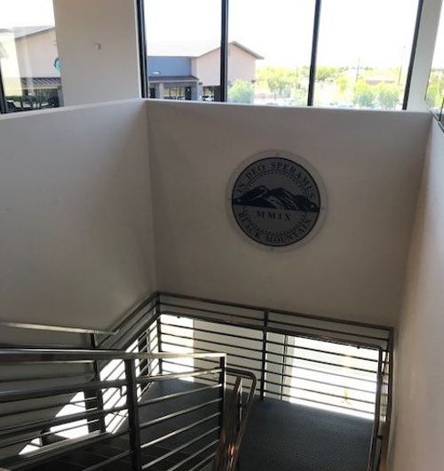A circular sign bBoard inside a building