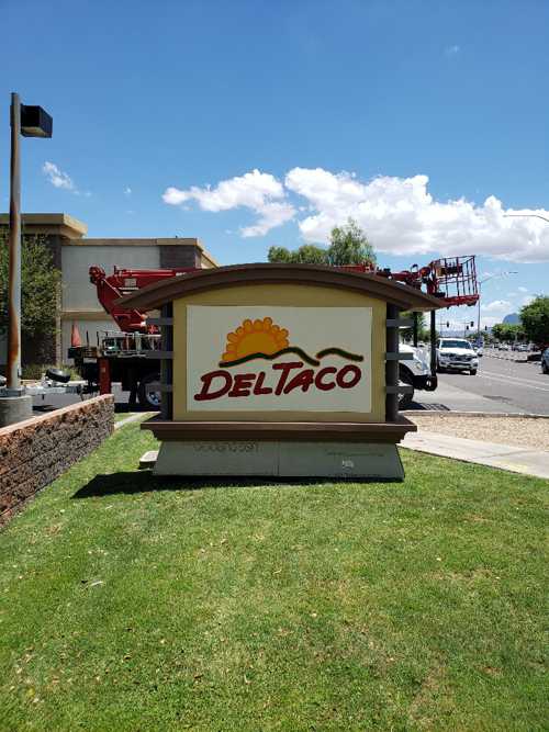 DelTaco logo and illustration as a signboard