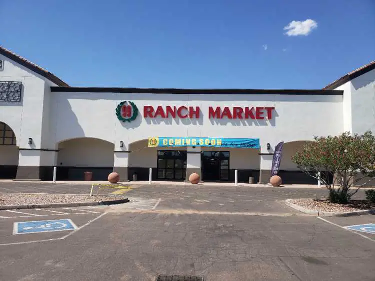 A storefront of ranch market on a sunny day